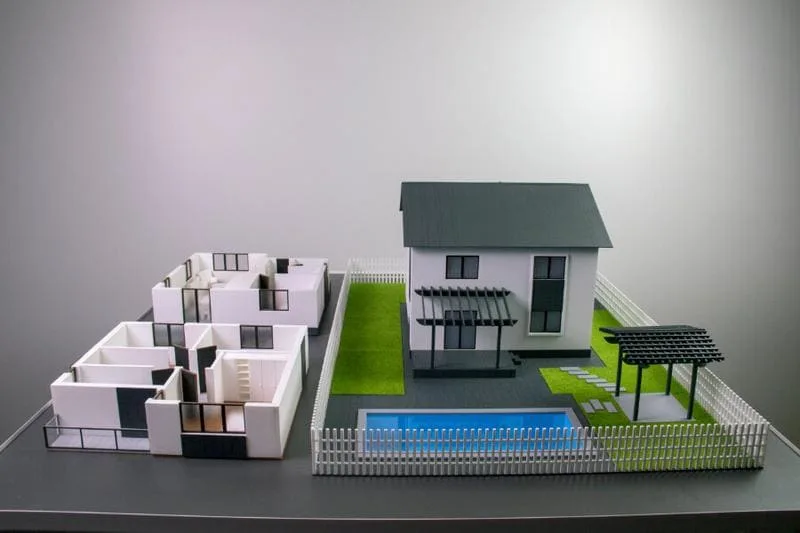 A detailed architectural model showing intricate facade work